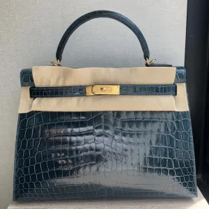 Hermès Kelly 32 Colvert Sellier Crocodile Niloticus Lisse Gold Hardware GHW